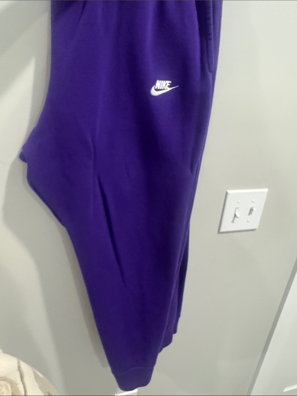 Purple Nike Sweatpants with White Swoosh